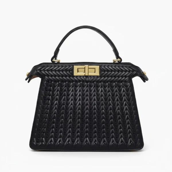 Front view of black woven vegan leather satchel bag with gold clasp and structured design