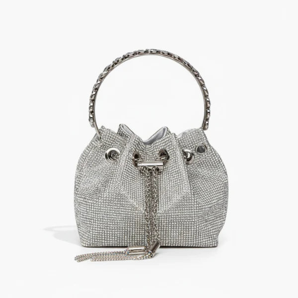 Aveline Rhinestone Crystal Evening Bag in silver, front studio view with circular metal handle and sparkling crystal exterior