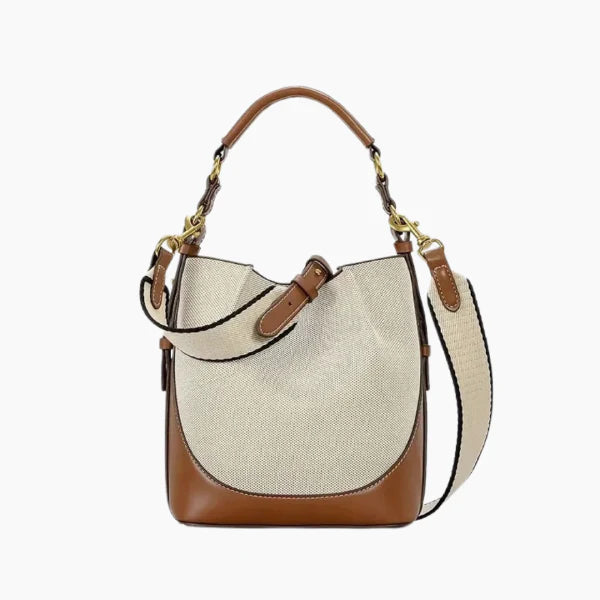 Calypso Vegan Leather Crossbody Bag in beige, front studio view showcasing structured bucket silhouette, top handle, and adjustable shoulder strap