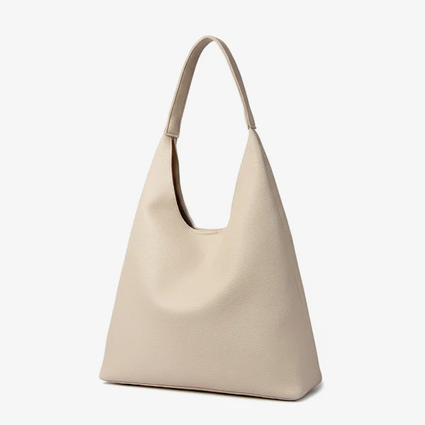 Front view of Elaria vegan leather hobo bag in off-white, with a spacious body and clean, sleek design