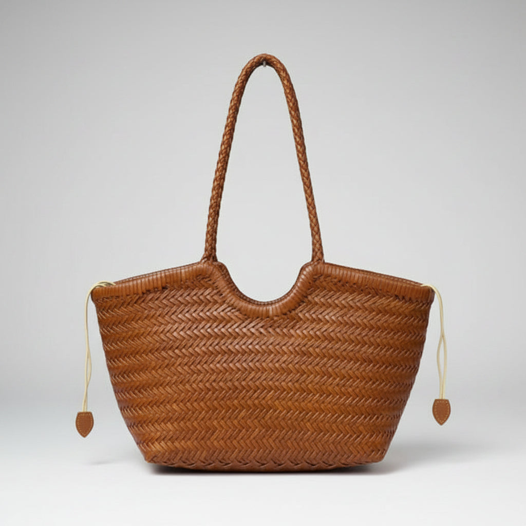 Front view of a brown woven leather tote bag with dual beige drawstrings