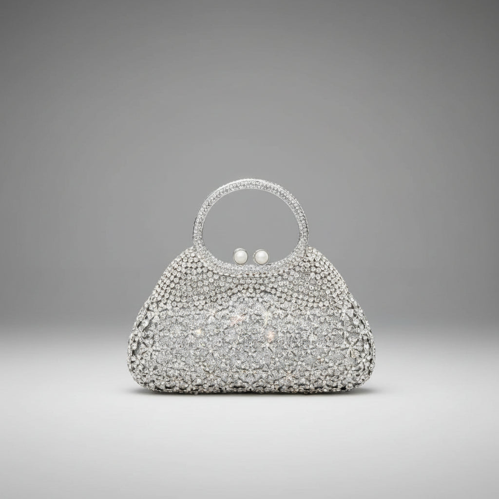Front view of serenna rhinestone evening bag in silver with detailed rhinestone embellishments and pearl clasp