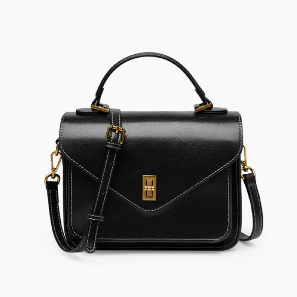 Front view of the black genuine leather satchel bag with a gold-tone clasp, offering a structured design and versatile style for any occasion