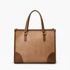 Front view of the Anelisse vegan leather tote bag in brown with a sleek design and contrasting leather details