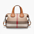 Front view of a brown vegan leather tote bag with a minimalist design, offering both style and practicality
