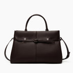 Front view of a brown coffee-colored genuine leather tote bag with a sleek buckle design, perfect for formal and casual occasions
