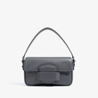 Faelina genuine cowhide shoulder bag in gray front view featuring a minimalist design with a stylish buckle