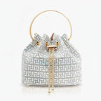 Lyanna Metallic Embellished Bucket Bag in silver, front studio view showcasing round top handle and sparkling geometric pattern