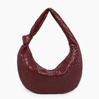 Maris Vegan Leather Hobo Bag in wine red, front view showing woven hobo silhouette and knotted shoulder strap