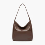 Front view of Seliora vegan leather shoulder bag in coffee color with minimalist design and front pocket