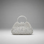 Front view of serenna rhinestone evening bag in silver with detailed rhinestone embellishments and pearl clasp