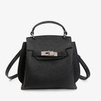 Front view of the black genuine leather satchel bag with silver metal details, offering a compact and stylish design perfect for daily use