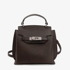 Front view of the coffee brown genuine leather satchel bag with silver hardware, designed for both elegance and functionality