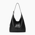 Sorella Vegan Leather Hobo Bag in black, front view of sleek minimalist hobo with adjustable shoulder strap