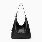 Sorella Vegan Leather Hobo Bag in black, front view of sleek minimalist hobo with adjustable shoulder strap