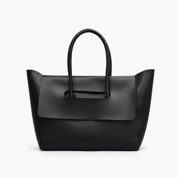 Front view of black vegan leather tote bag with structured design and elegant flap closure for a sophisticated look