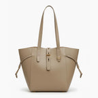 Front view of the Zairen genuine cowhide tote bag in khaki with sleek design and adjustable side straps