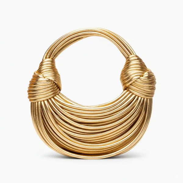 Zyra Vegan Leather Evening Bag in gold, front studio view showcasing crescent silhouette with layered cord texture